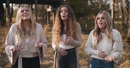 Christian women singing &ldquo;Down To The River To Pray&rdquo;