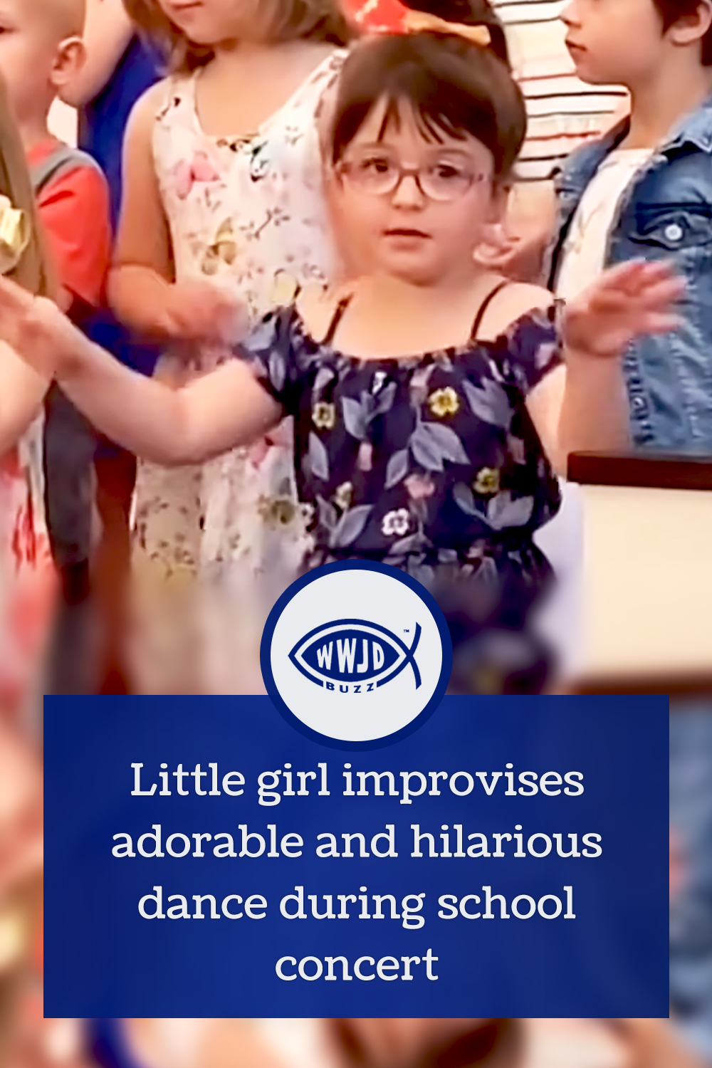 Little girl improvises adorable and hilarious dance during school concert